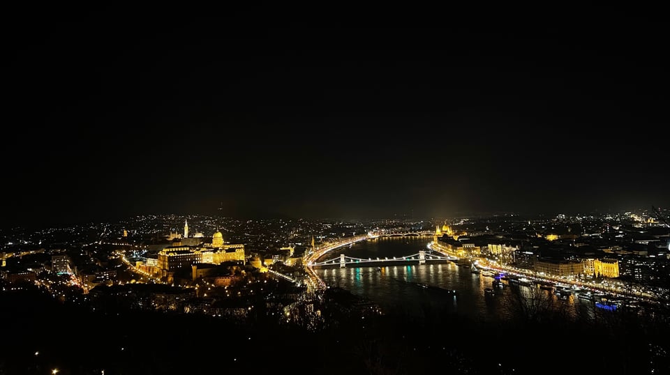 Budapest and the river illuminated at night