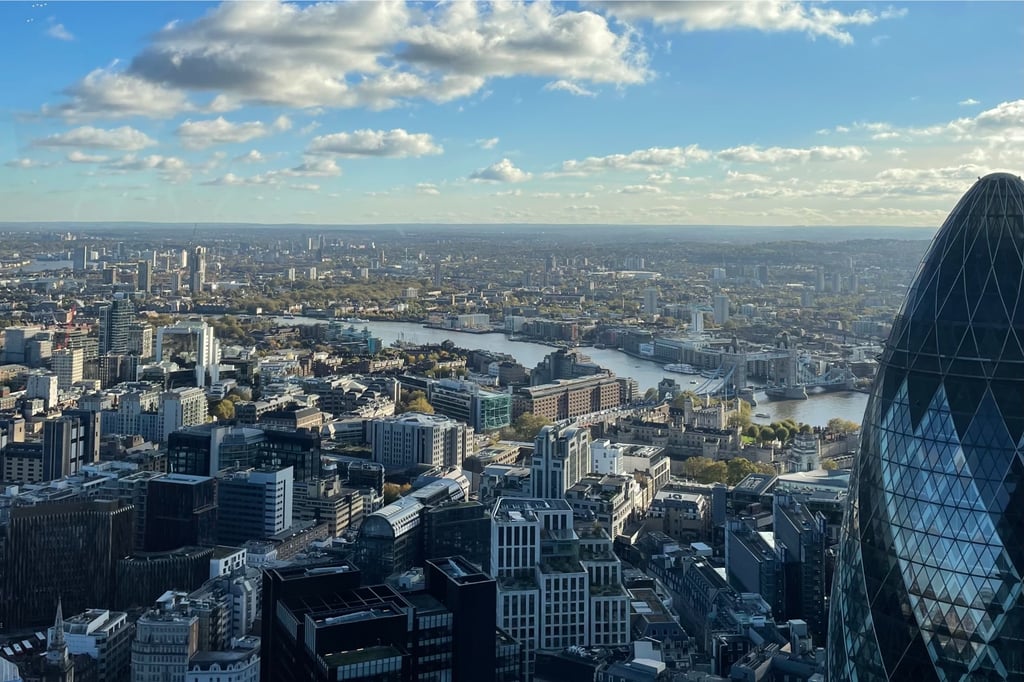 London skyline with the Gherkin beneath a blue sky